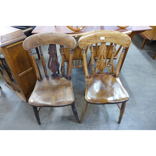 78 - A pair of Victorian elm and beech and kitchen chairs