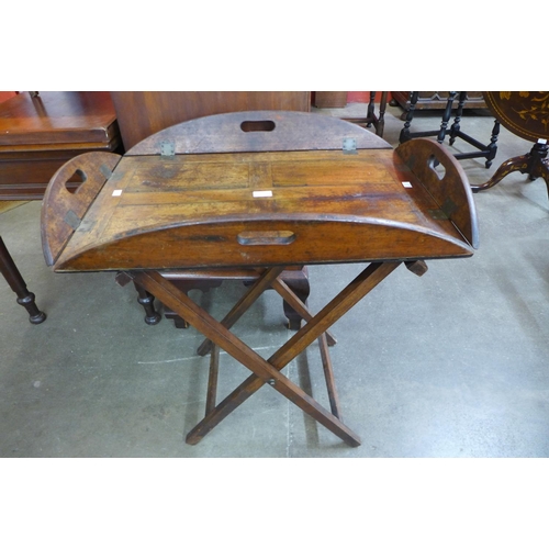 86 - A Victorian mahogany butler's tray on stand