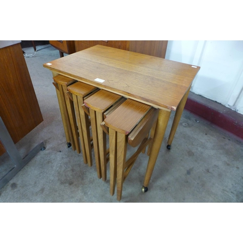 97 - A teak nest of tables