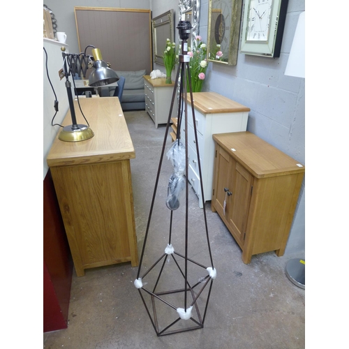 1579 - A steel standard lamp base  *This lot is subject to VAT