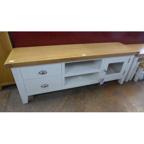 1609 - An oak and white large TV stand   *This lot is subject to VAT