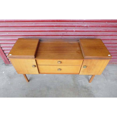 145e - A small teak sideboard