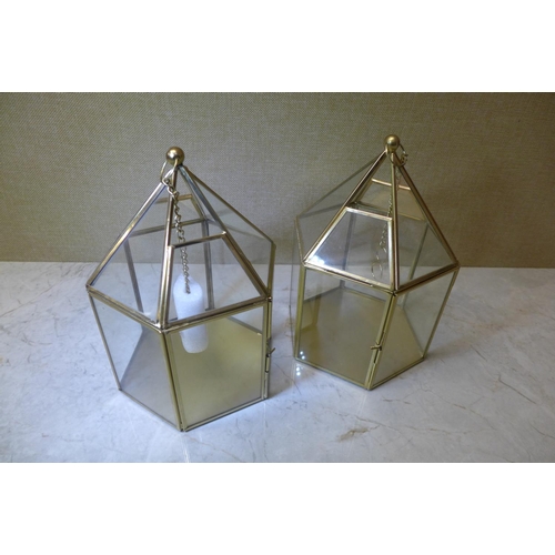 2097 - Two metal framed decorative hanging lanterns