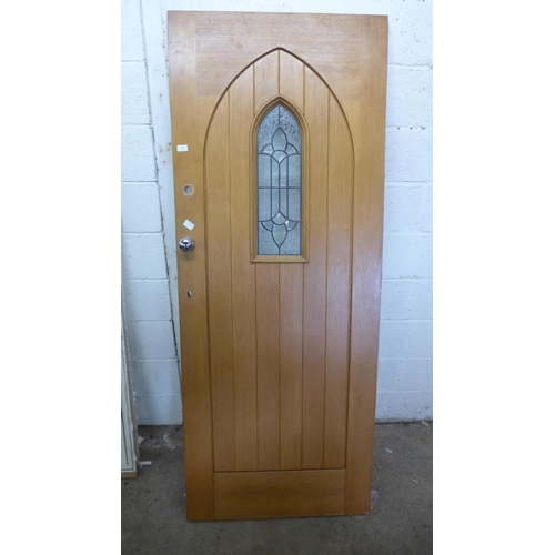 2401 - Solid oak church style back door with lead glass window panel - requires lock and key - size approx.... 