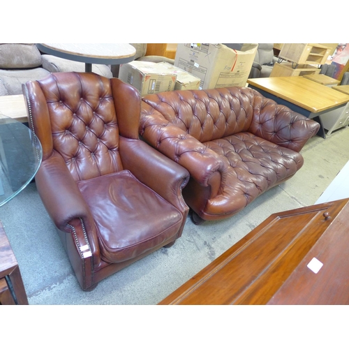 1867 - A chestnut leather buttoned sofa and armchair