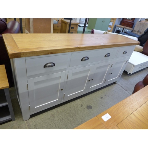 1883 - An oak three drawer, four door painted sideboard  * this lot is subject to VAT Damaged general all r... 