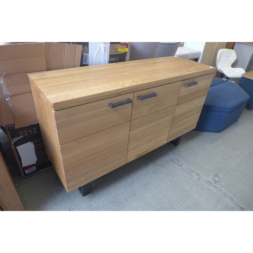 1892 - A Fusion oak large three door sideboard - damage to base