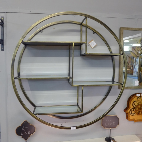 1352 - A circular wall display with bevelled glass shelves (2043679)   #