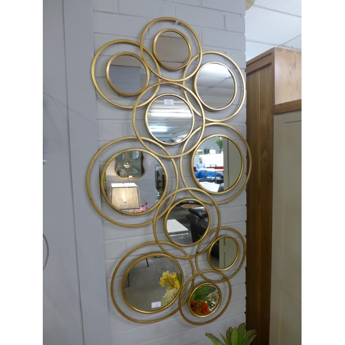 1506 - A gold circular abstract mirror (2080447)   #