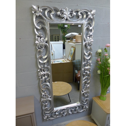 1588 - A large silver finish wall mirror, 181 x 91cms