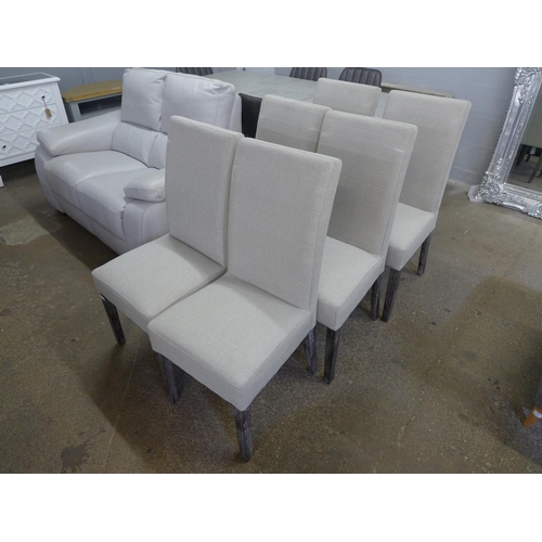 1607 - A set of six grey upholstered dining chairs  *This lot is subject to VAT