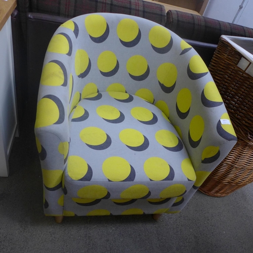 1874 - A grey and yellow polka dot retro tub chair