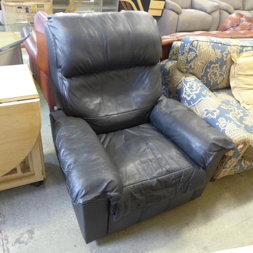 1879 - A black leather manual recliner - badly worn