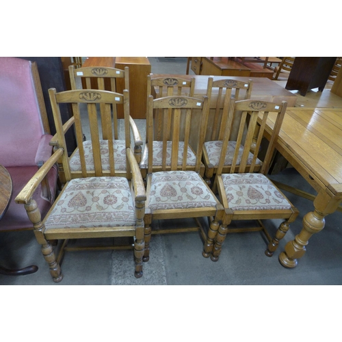 213 - A set of six oak dining chairs