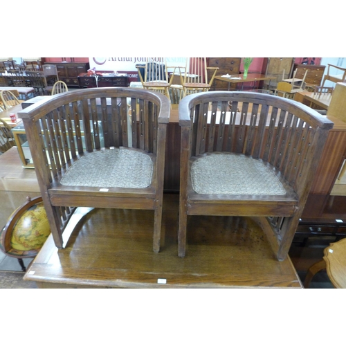 209 - A pair of Arts and Crafts style beech tub chairs