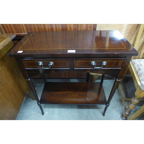 212 - An inlaid mahogany two drawer side table