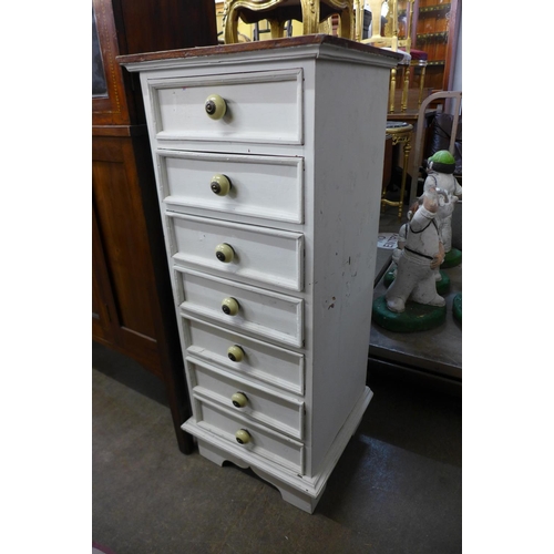 250 - A small French style painted semanier chest of drawers