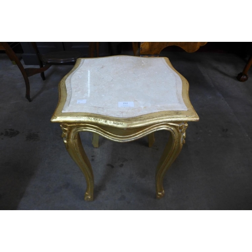 252 - A French style gilt wood and marble topped jardiniere stand