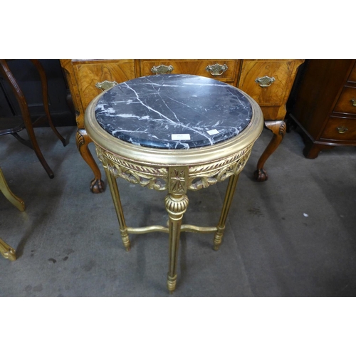 253 - A French style gilt wood and marble topped jardiniere stand