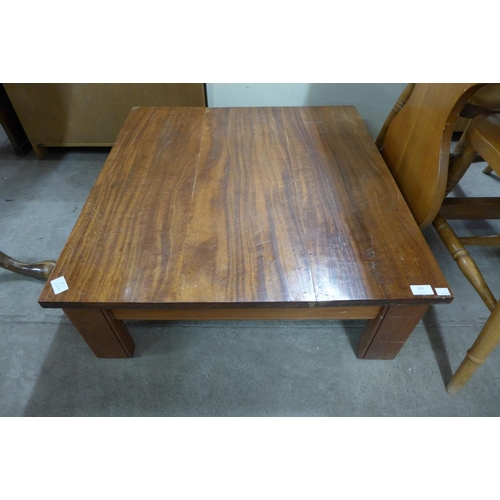 279 - A hardwood square coffee table