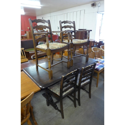 281 - An oak refectory table and four chairs