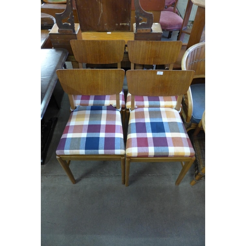 282 - A set of four teak chairs