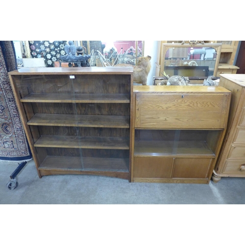 301 - An oak bookcase and a bureau