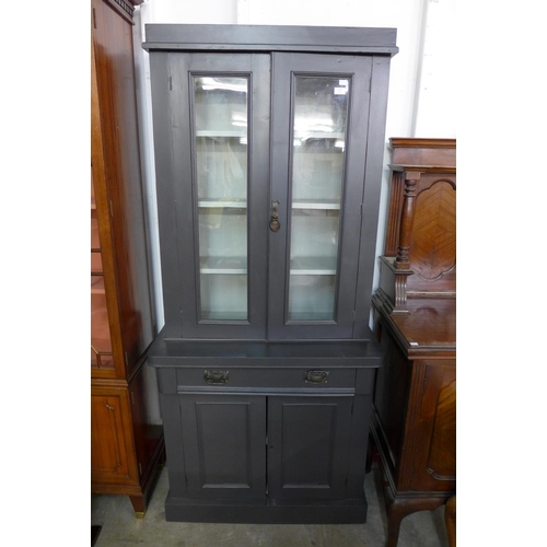 306 - A Victorian style painted four door bookcase