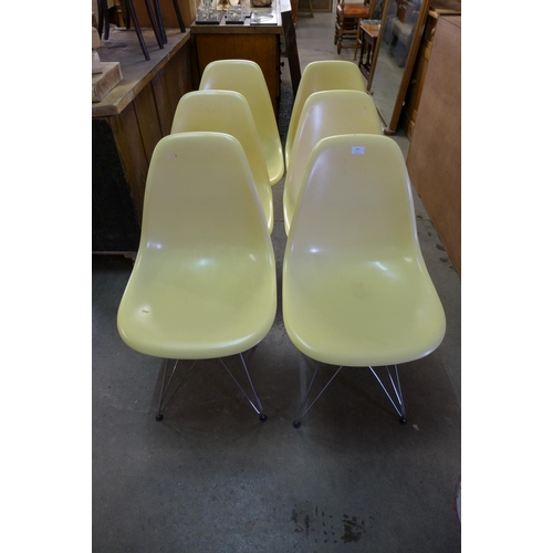 308 - A set of six Eames style chrome and plastic chairs