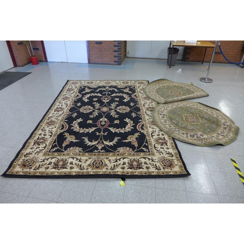 313 - Three assorted rugs