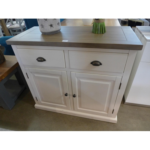 1551 - A white farmhouse style two door sideboard * this lot is subject to VAT