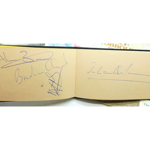 681 - A signed Joe Mercer biography, a Newmarket 31 July 1982 programme with autographs, an autograph book... 