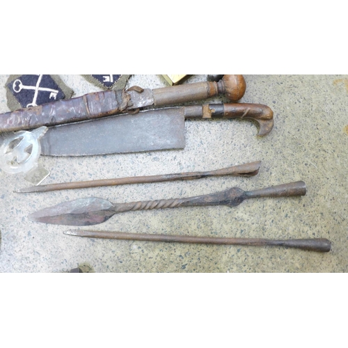 728 - Four daggers, arrow heads, axe, etc.