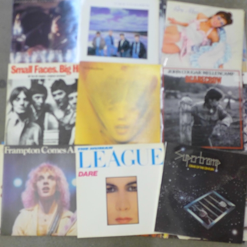 734 - A collection of thirty-four LP records, 1970's and 1980's, including Queen Sheer Heart Attack factor... 