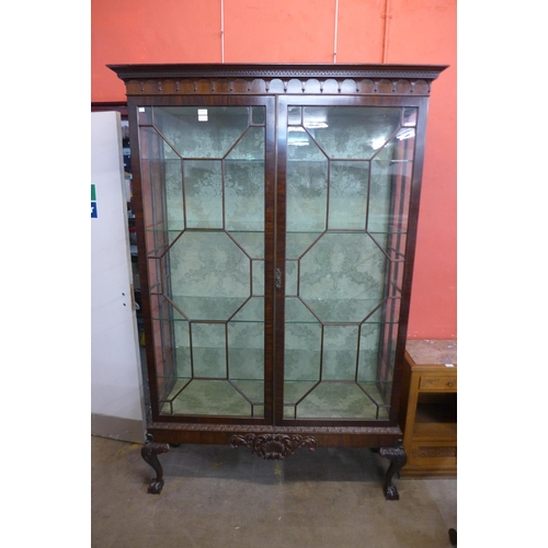 39 - An Edward VII Chinese Chippendale Revival carved mahogany display cabinet, 211cms h, 138cms w, 46cms... 