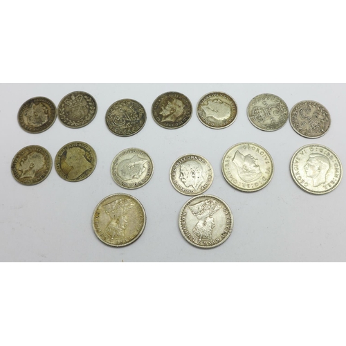 1006 - Four pre-1947 sixpences and eleven silver threepences, 26.5g