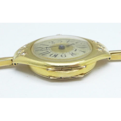 1016 - A lady's 14ct gold and diamond Art Deco wristwatch, 19g gross weight, case dented