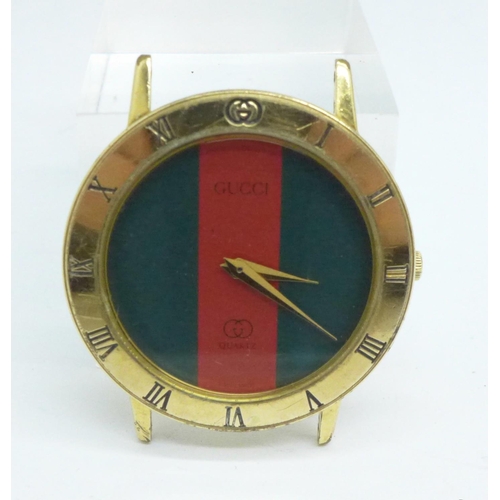 1022 - A Gucci wristwatch head