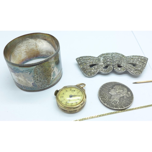 1035 - A plated napkin ring, rolled gold wristwatch head, stick pin, brooch/clip, necklet and medallion