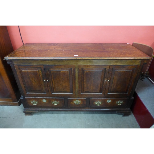 174 - A George III oak mule chest (converted to a cupboard)