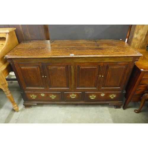 174 - A George III oak mule chest (converted to a cupboard)