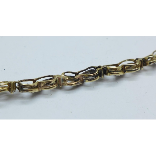 1054 - A 9ct gold and diamond bracelet, 8.9g, a/f