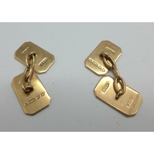 1069 - A pair of 9ct gold cufflinks dated August 21st 1937, 6.2g