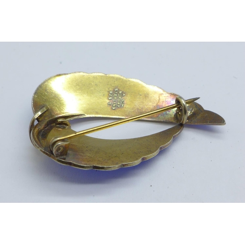 1078 - An Albert Scharning blue enamel and silver gilt brooch