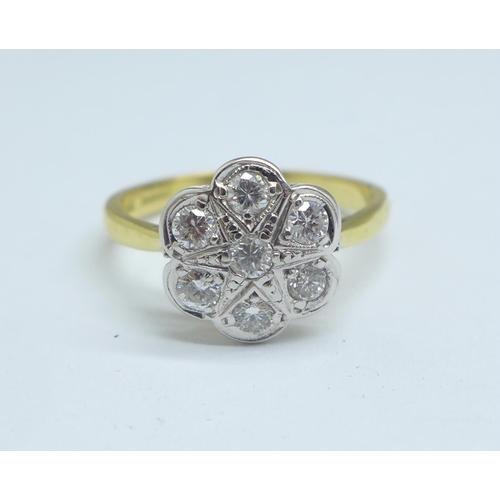 1083 - An 18ct gold, flat bed diamond daisy cluster ring, 4.5g, R