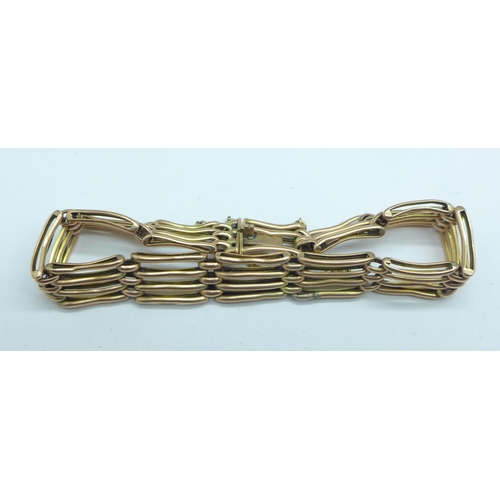 1087 - A yellow metal bracelet, 12.4g (stamped 10 in the clasp)