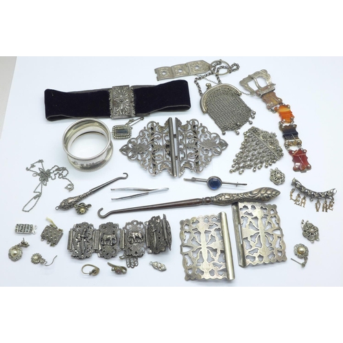 1089 - Silver, white metal and plated jewellery, a silver napkin ring, silver button hooks, etc.