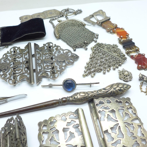 1089 - Silver, white metal and plated jewellery, a silver napkin ring, silver button hooks, etc.