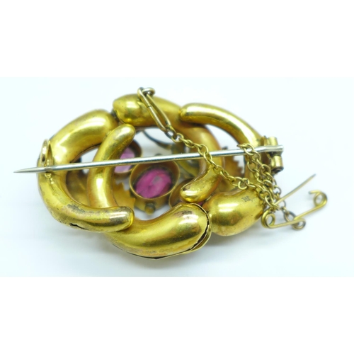 1103 - A Victorian yellow metal set three stone amethyst brooch, a/f, 8.1g