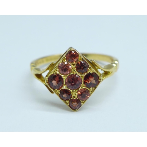 1109 - A 14ct gold and orange stone ring, 3.4g, R